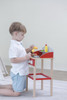 SPARK & WOW Children's Grill BBQ Playset, young boy playing with toy grill and BBQ accessories in indoor setting. SPARK & WOW Children's Grill BBQ Playset, young boy playing with toy grill and BBQ accessories in indoor setting.