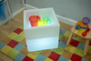 TickiT Sensory Mood Light Play Cube, illuminated sensory play cube with colorful cups for engaging children's sensory development and play activities.