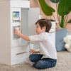 Little Chef Charlotte Modern Play Kitchen close with boy