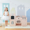 Little Chef Fairfield Retro Pink Play Kitchen with girl