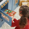 Teamson Kids Little Chef Atlanta Stone Blue Large Modular Kids Kitchen, child playing with holiday-themed pretend cookies on a tray, detailed view of the toy kitchen setup.