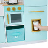 Teamson Kids Biscay Delight Classic Mint Play Kitchen with Magnetic Refrigerator, colorful toy kitchen with mint green and gold accents, oven, stove, and refrigerator with ice dispenser.