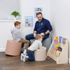 Children's Factory Soft Ottoman Trio - Elements, a set of three soft, colorful ottomans used as seating in a children's reading area.