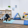 Children's Factory Tent Box Play Mats, Tranquility - Set of 2, indoor play area with child demonstrating a forward roll on soft blue and gray play mats. Children's Factory Tent Box Play Mats, Tranquility - Set of 2, indoor play area with child demonstrating a forward roll on soft blue and gray play mats.