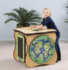 Playscapes Safari Activity Island Play Cube, a wooden activity cube with colorful animal and nature-themed designs, designed for children's play and learning.