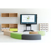 Moje Bambino Paolo Long Foam Bench Seats, colorful modular foam seats arranged in a semi-circle around a classroom with a large digital screen and shelves.