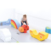 Moje Bambino Play Elements for Play Corner Mats, colorful foam animal-shaped play blocks arranged on soft mats in a bright playroom with a child playing