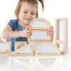 Guidecraft Mirror Wooden Blocks, child playing with natural wood-colored mirror blocks for creative learning and stacking.