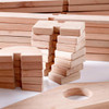 Guidecraft Notch Wooden Blocks Storage Cart, stack of natural wood building blocks with a circular hole in a large flat piece of wood.