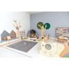 Moje Bambino Tree with Rounded Crown Kid's Wall Decor, a playful children's room with tree wall art, a cozy tent, and various toys and furniture.