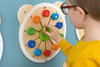 Moje Bambino Match the Numbers Sensory Wall Toy, a wooden educational wall panel with colorful numbered blocks and pegs for tactile matching activities.