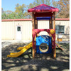 Infinity Playgrounds Sea N Me Tot Toddler Playground Climber, colorfully designed outdoor kids' playset with slides, a tunnel, and a shaded top for outdoor play.