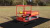 Infinity Playgrounds Fire Engine Spring Rider, children's playground ride shaped like a fire truck on springs in a park.