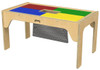 Jonti-Craft Mesh Bag for Fun Builder Duplo/Lego Tables, a black mesh bag attached underneath a wooden children's play table with colorful building tiles on top.