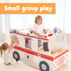 SPARK & WOW Super Ambulance Playhouse, a colorful small indoor ambulance-themed play house for children with medical-themed details and a small group play setting.