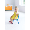 Moje Bambino Stackable Bambino Medal Classroom Chair, young girl sitting on blue classroom chair in bright room with white walls and window