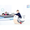 Moje Bambino Soft Foam Rocking Seats, a child sitting on a cute duck-shaped foam rocking seat in a bright, modern playroom