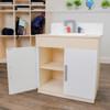 Angeles White Play Sink - RTA, children's play sink with a white basin, gray and red faucet, and storage cabinet underneath with open shelves.