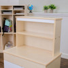 Angeles White Play Hutch - RTA, wooden child’s play hutch with white accents on the top, featuring two open shelves on a light wood finish.