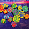 LiteZilla MagWiz Magnetic Wall Gears, colorful interlocking gear toys in various sizes and colors.