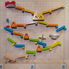 LiteZilla Kidworx Turbo Trax Raceway Wall Ball Run, colorful wooden ball run toy setup on a pegboard wall with various slopes, ramps, and pathways for balls