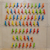 LiteZilla Kidworx Instant Reset Domino Dash Wall Activity, colorful domino blocks arranged on a wall for a fun educational game.