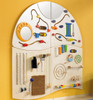 HABA Pro Sensory Learning Wall 4-Piece Set, mounted wooden sensory wall with various tactile and visual sensory toys and tools for children's sensory development.