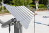 Freenotes Aria Outdoor Metallophone, silver metal xylophone in an outdoor park setting.