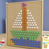 Flash Furniture Bright Beginnings Multicolor Jumbo Peg Accessory Pack for Modular STEAM Wall Systems, colorful peg set on a beige pegboard displaying a large pencil shape.