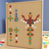 Flash Furniture Bright Beginnings Shape Set for Modular STEAM Wall Systems - 256 Pack, educational colorful shapes and pieces attached to a pegboard for STEM learning and creative play.