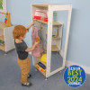 Whitney Brothers elevatED™ Dress Up Station, child playing with dress-up clothes on a classroom wooden storage unit.