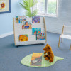 Whitney Brothers elevatED™ Mobile Book Display, white wooden mobile book display with multiple compartments filled with children's books in a classroom setting.