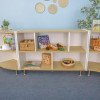 Whitney Brothers elevatED™ Storage Cabinet 33H, a versatile light wood-colored storage unit with open shelves and white side panels, placed in a children's room with educational toys and books.