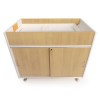 Whitney Brothers elevatED™ Infant Changing Cabinet, wooden infant changing table with sliding doors and storage compartments on wheels.