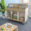 Whitney Brothers elevatED™ Mobile Book Storage Island, educational storage furniture with books and toys in a children's playroom.