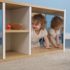 Whitney Brothers elevatED™ Discovery Crawl Thru Cabinet, children playing and crawling through a wooden cabinet with mirror panels in a children's play area.
