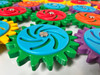 LiteZilla MagWiz Magnetic Sensory Gears STEM Wall Activity - 15x5, colorful plastic gears with magnetic centers for sensory and STEM educational activities.
