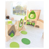Moje Bambino Flora Sensory Play Panel Partition #5, indoor children's play area with wooden play panels, green leaf and fruit designs, and soft green stepping cushions.