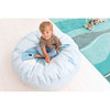 Moje Bambino Sea Dolphin Floor Cushion, a large round soft cushion with a blue sea dolphin design, suitable for kids to sit and play on.