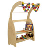 Wood Designs Arched Playstand, wooden kids' play furniture with multiple shelves and colorful decorations including leis, books, toys, and a plush owl.