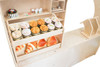 Wood Designs Town Collection Café Playhouse, toy bakery display with wooden cupcakes, pastries, and baked goods.