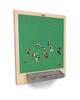 Jonti-Craft Building Brick Activity Wall, green pegboard with colorful building bricks arranged on it and a gray tray at the bottom for storage.