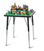 Jonti-Craft Adjustable Building Table - Traditional Brick Compatible, a child-size adjustable height table with a LEGO brick-compatible surface, featuring LEGO creations on top, ideal for educational and play activities.