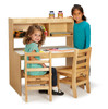 Jonti-Craft Dual Writing Desk, Wooden children's study desk with two chairs and multiple storage shelves for kids' art supplies and books.