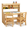 Jonti-Craft Dual Writing Desk, wooden children's desk with two chairs and storage shelves, equipped for educational and artistic activities.