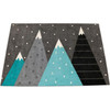 Moje Bambino Summit Mountain Carpet, a children's rug featuring a mountain landscape with snow-capped peaks and snowflakes on a dark background.