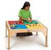 Jonti-Craft Large Wooden Kids LEGO® Square Storage Table, a sturdy wooden table with a LEGO compatible surface and colorful LEGO bricks scattered on top for children to build and play.