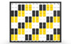 LiteZilla Mosaico Wall with Triangles STEM Wall Activity, interactive wall panel with black and yellow geometric tiles arranged in a repeating pattern