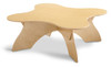 Jonti-Craft Blossom Classroom Table, light wood-colored children’s activity and study table with a flower-shaped top and sturdy curved legs for a classroom or daycare setting.