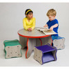 Playscapes Wavy Table and 4 Stool Set, colorful kids' table set with wavy edges and matching stools in green, purple, and blue, designed for children to sit and play.